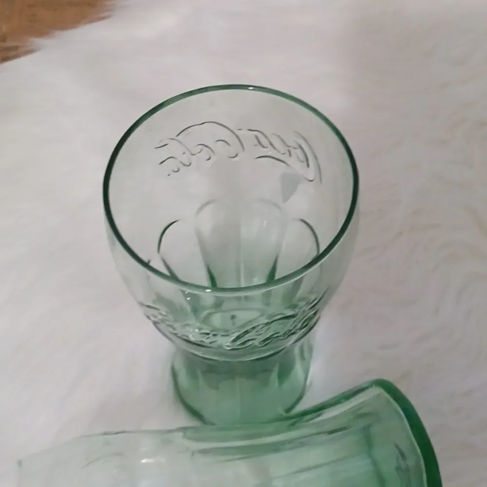 Pair of vintage green glass Coca Cola